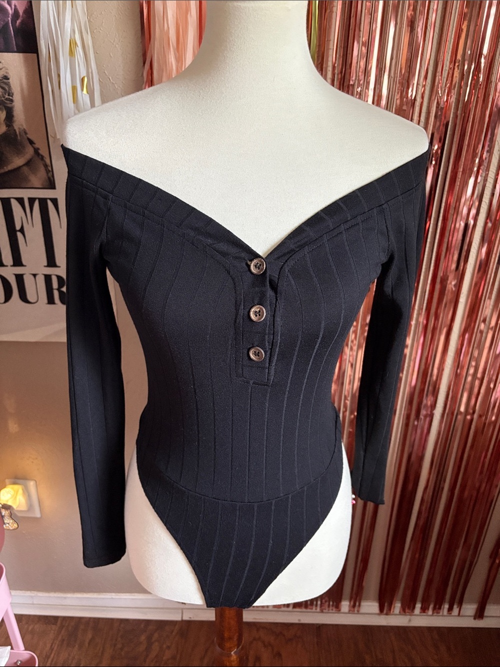 Off-Shoulder Long Sleeve Ribbed Thong Bodysuit in Black